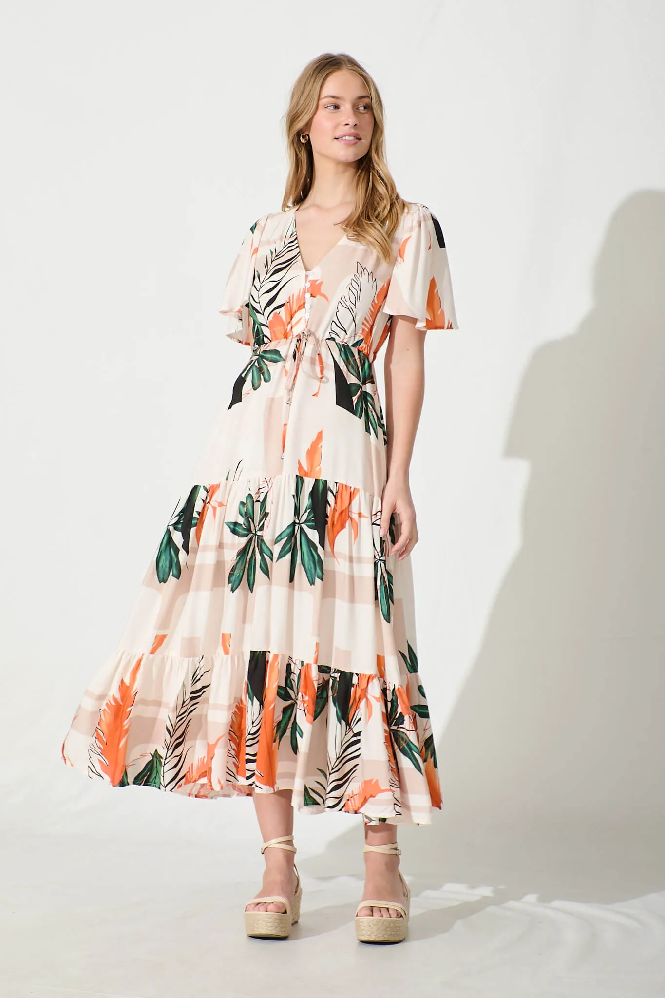 Elina Midi Dress in Cream with Green and Orange Leaf sold by St Frock