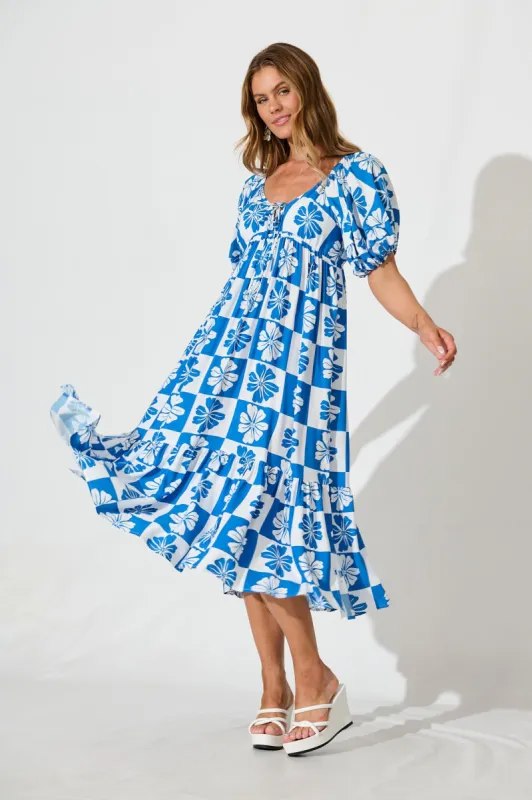 Marchena Midi Dress in Blue and White Flower Print sold by St Frock