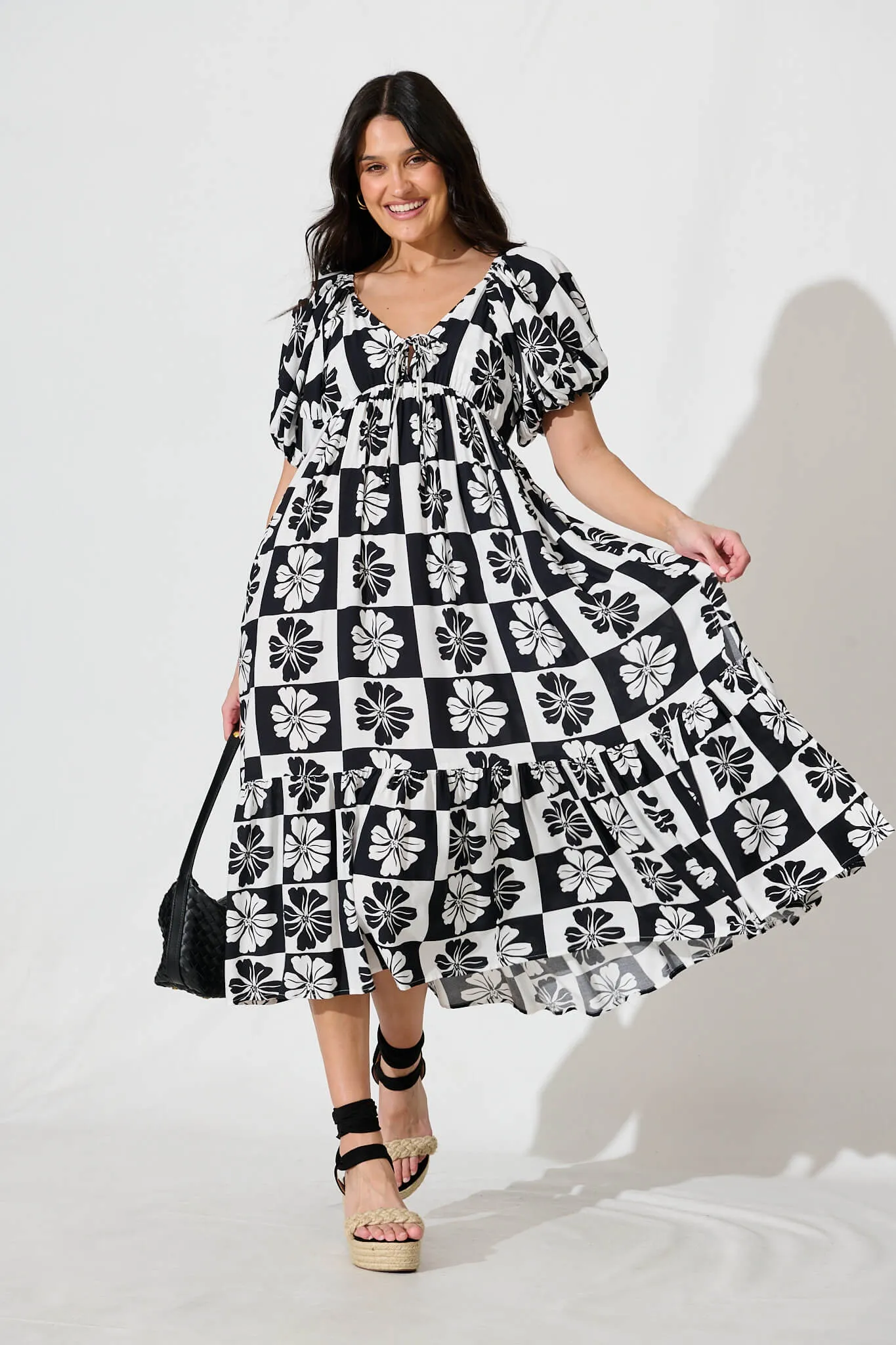 Marchena Midi Dress in Black and White Flower Print sold by St Frock