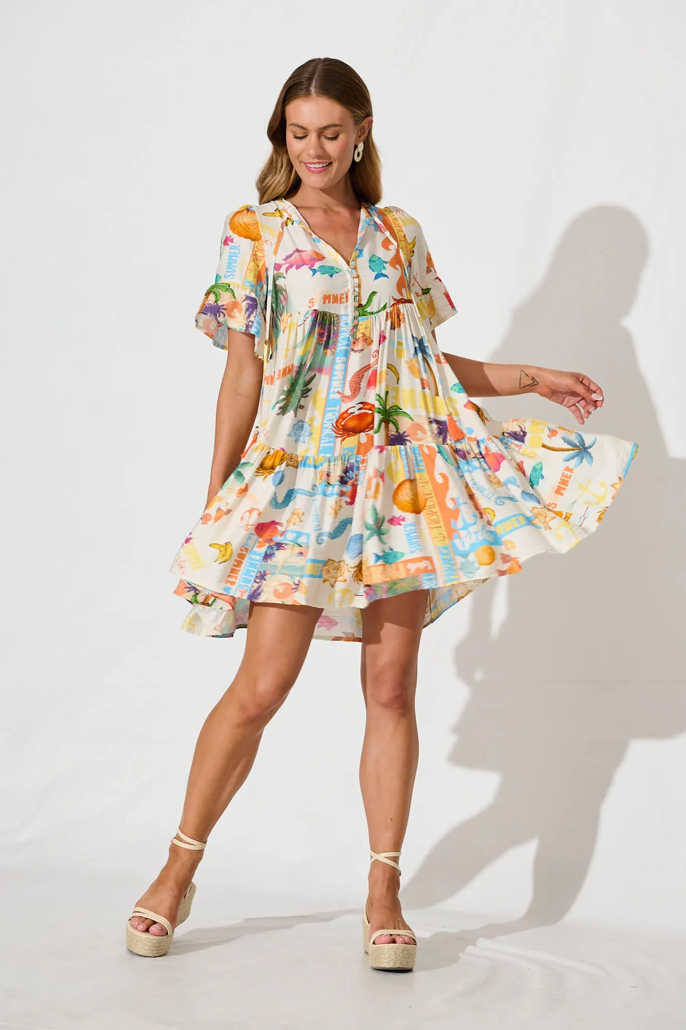 Tahnee Smock Dress In Cream With Multi Summer Print sold by St Frock