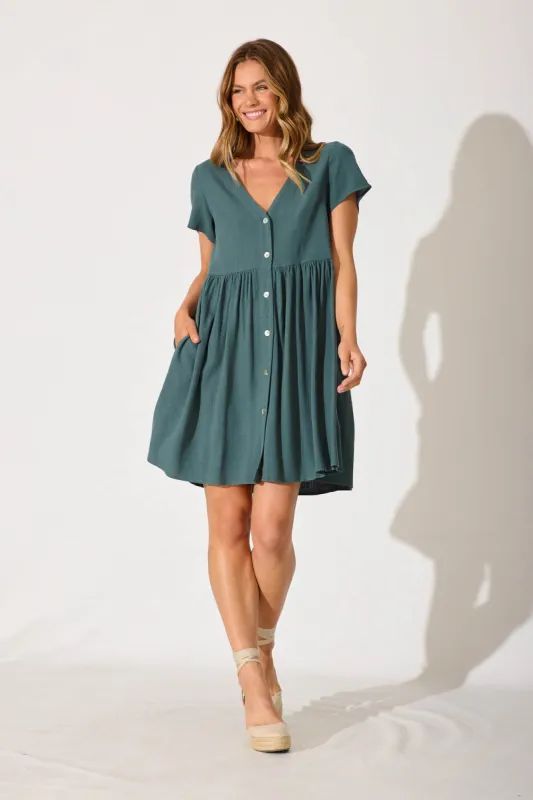 Horizon Smock Dress In Green Linen Blend sold by St Frock