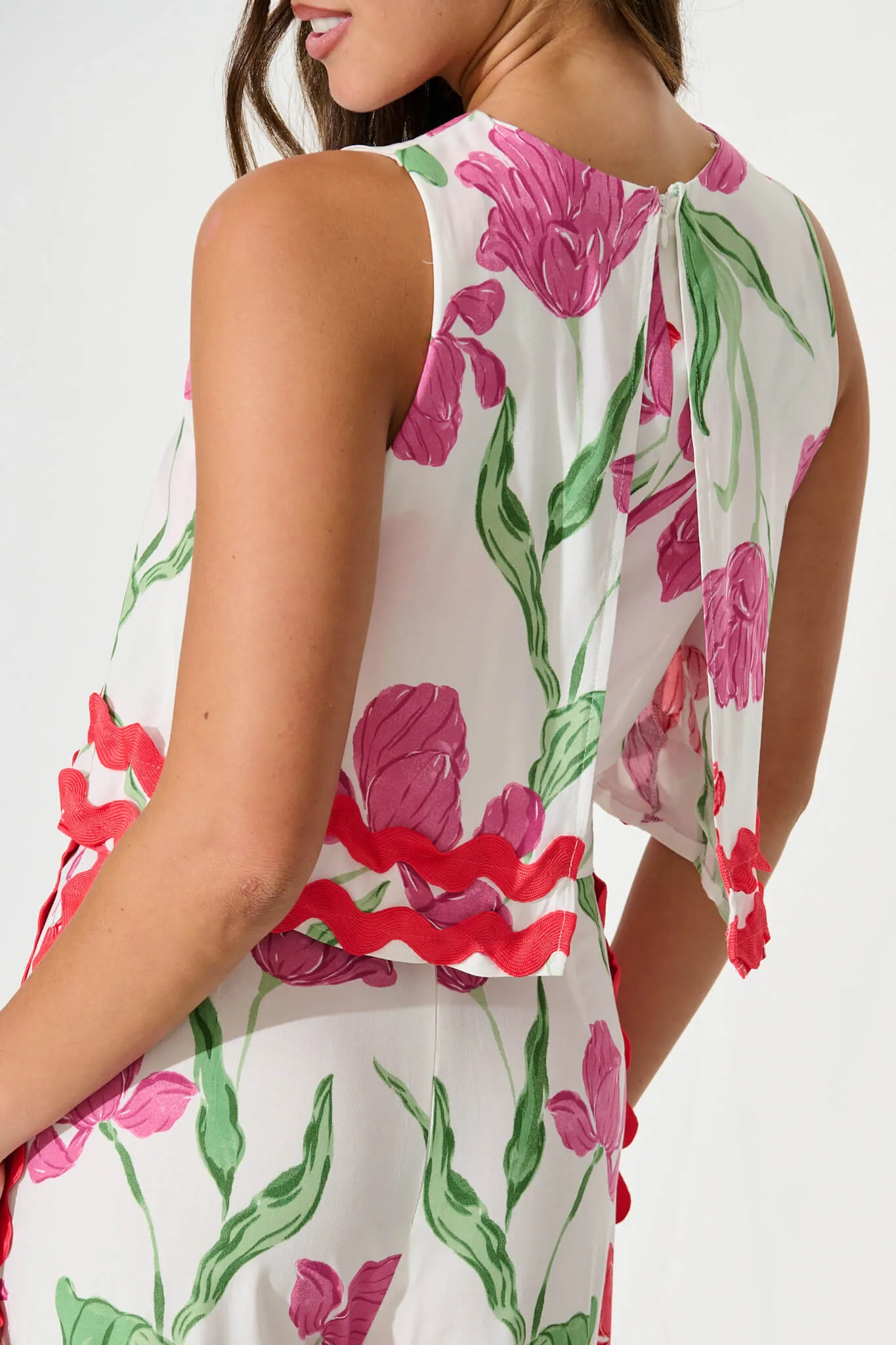 Sandbar Jumpsuit in White with Red and Purple Flower sold by St Frock product image thumbnail 5