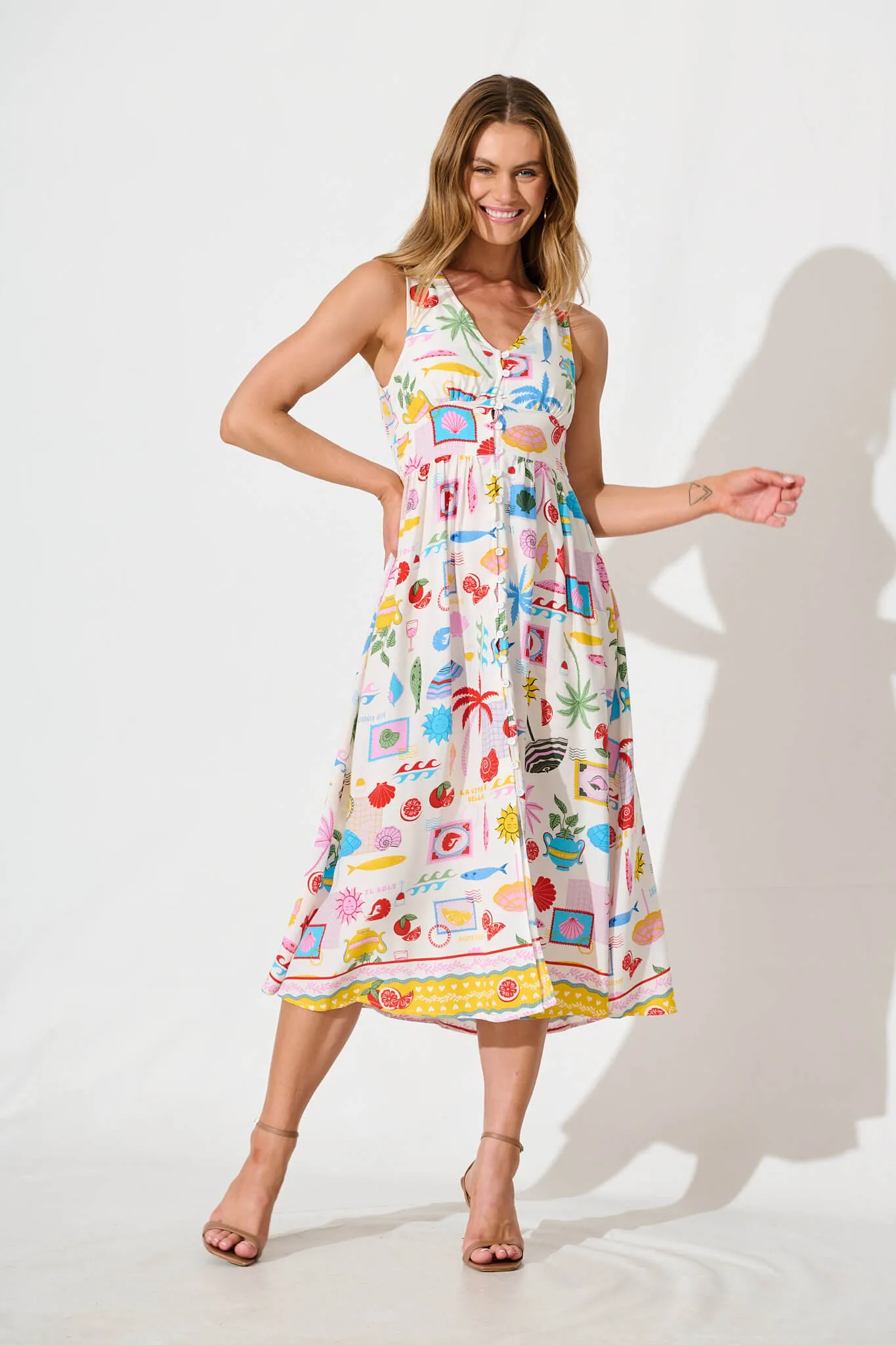 Ryland Midi Dress in White with Multi Conversational Print sold by St Frock