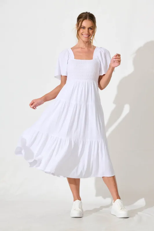 Akino Midi Dress in White sold by St Frock