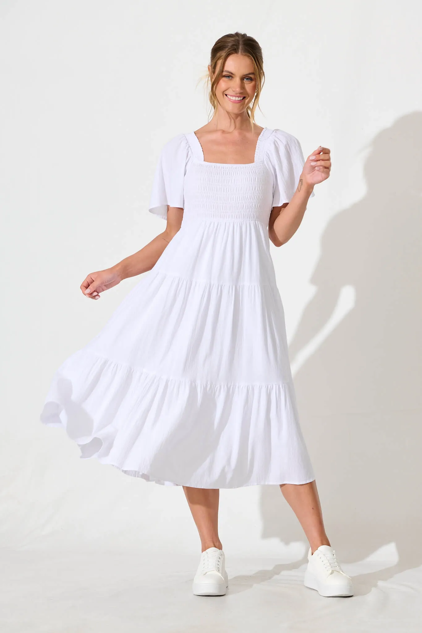 Akino Midi Dress in White sold by St Frock