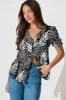 Tessy Top in Black with White Leaf sold by St Frock