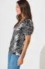 Tessy Top in Black with White Leaf sold by St Frock