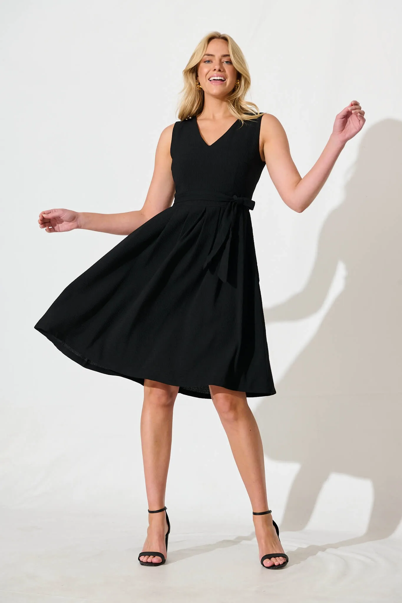 Jardina Dress in Textured Black sold by St Frock