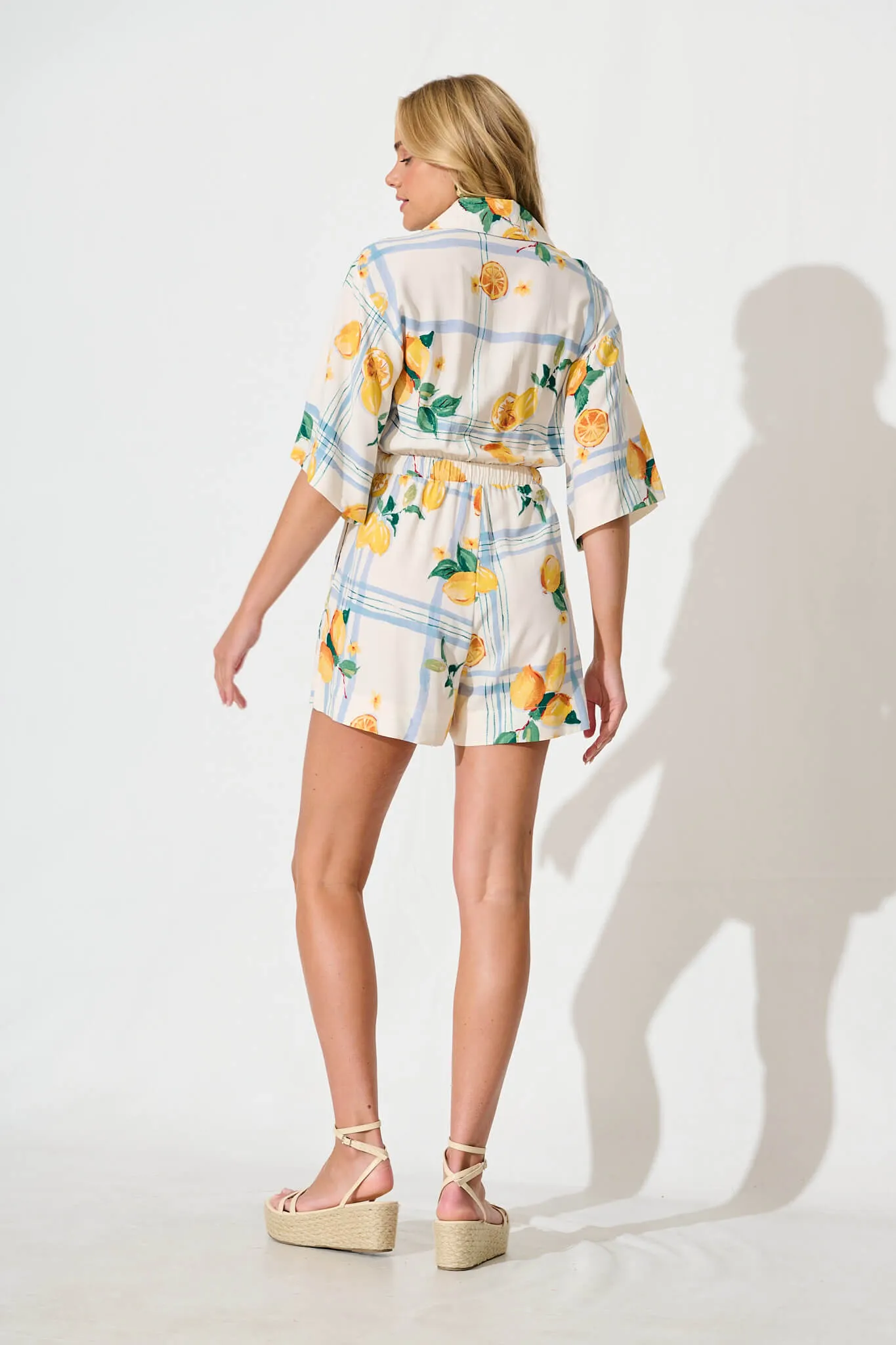 Maui Playsuit in Ivory with Lemon and Blue Print sold by St Frock product image thumbnail 4