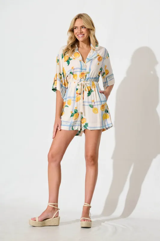 Maui Playsuit in Ivory with Lemon and Blue Print sold by St Frock