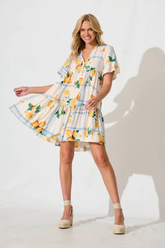 Tahnee Smock Dress in Ivory with Lemon and Blue Print sold by St Frock