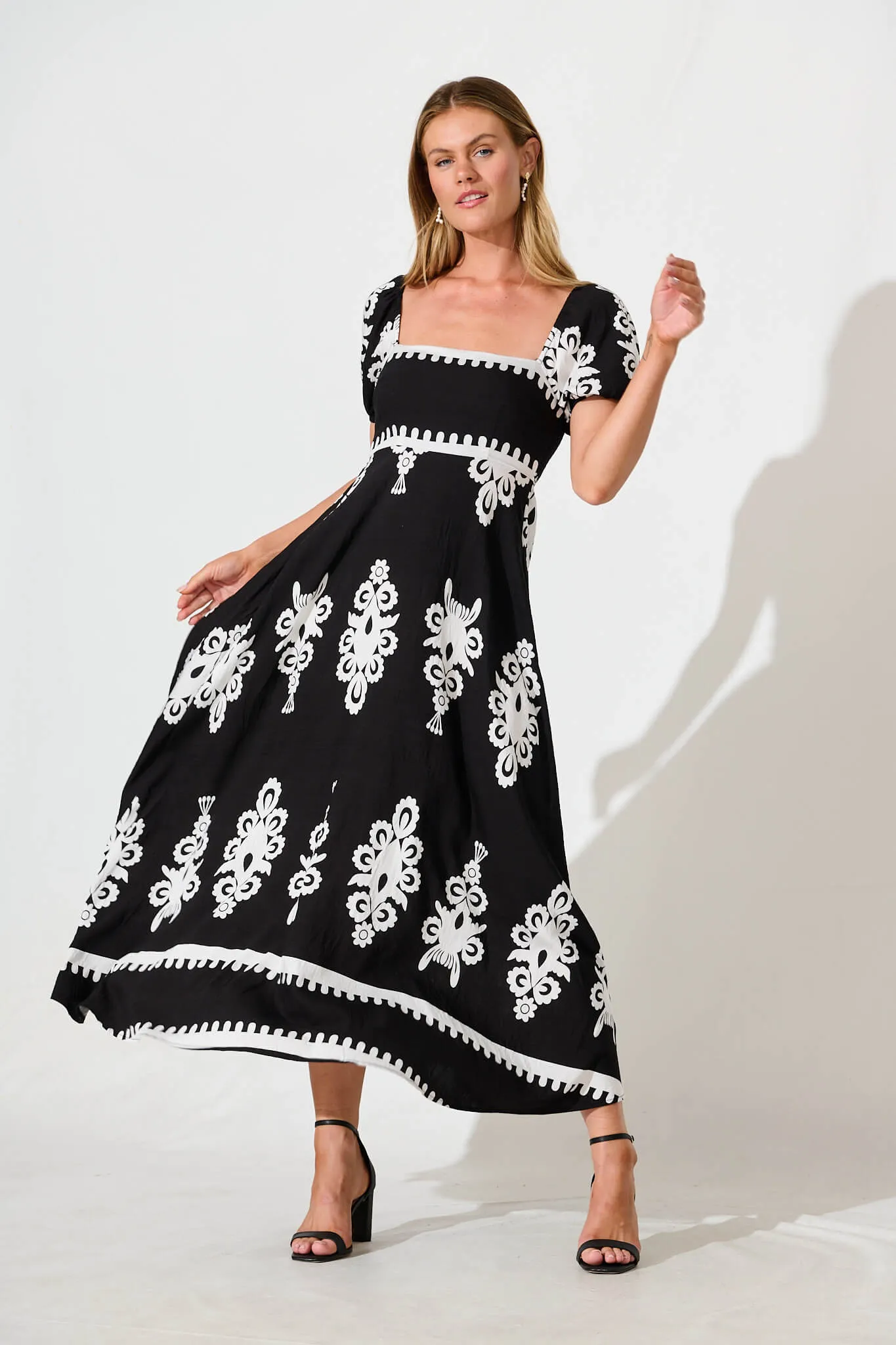 Norvi Maxi Dress in Black with White Print sold by St Frock