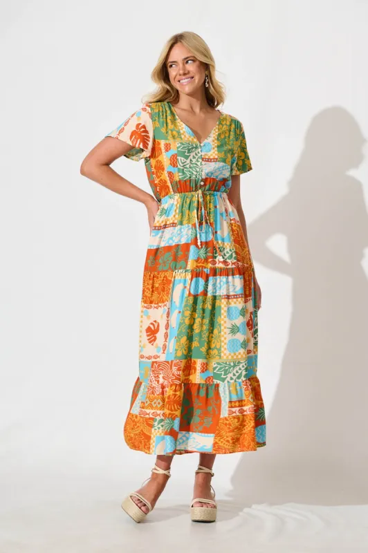 Sumaya Midi Dress in Multi Orange Print sold by St Frock