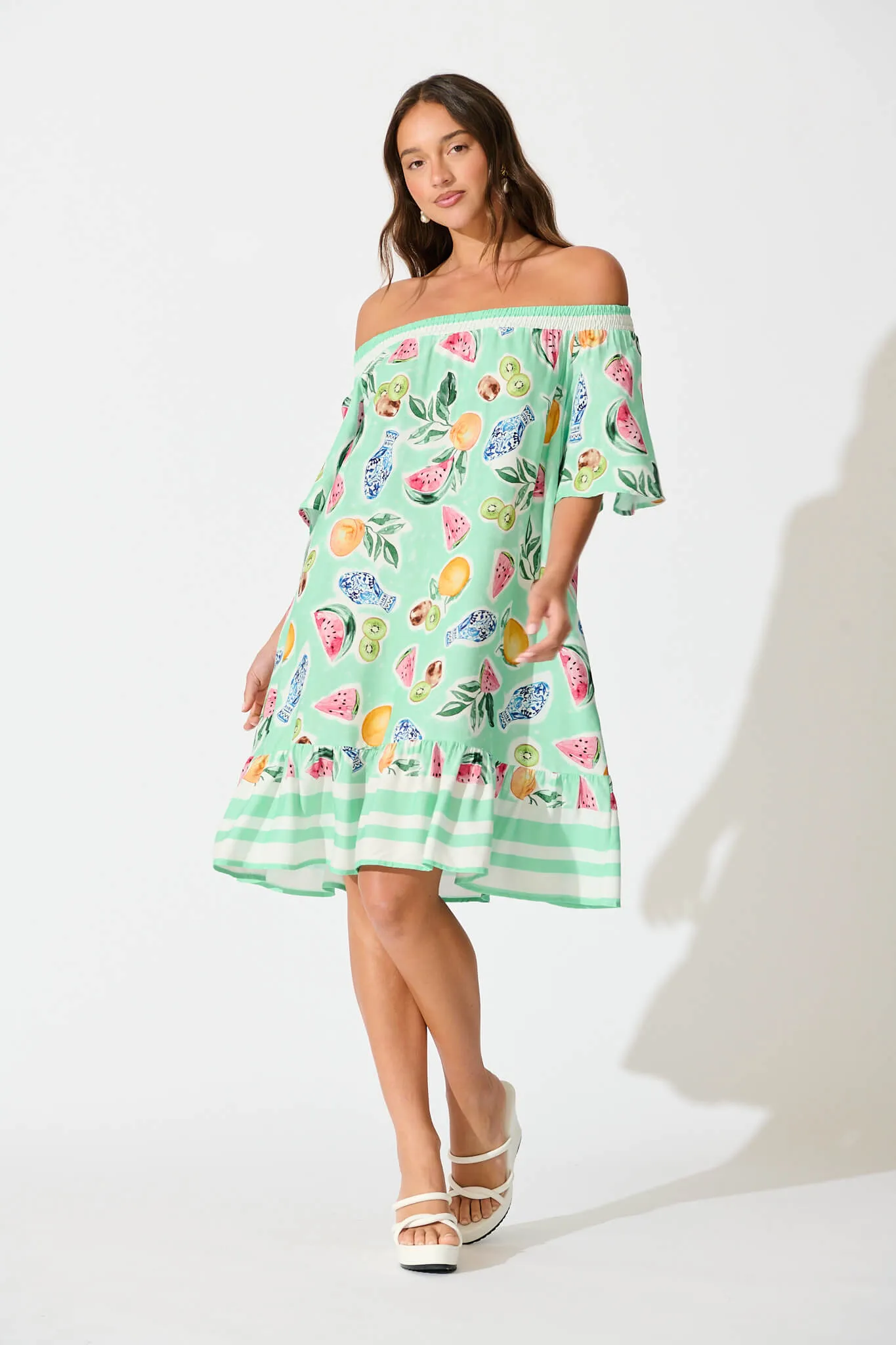 Janna Dress in Green with Multi Fruit Print sold by St Frock