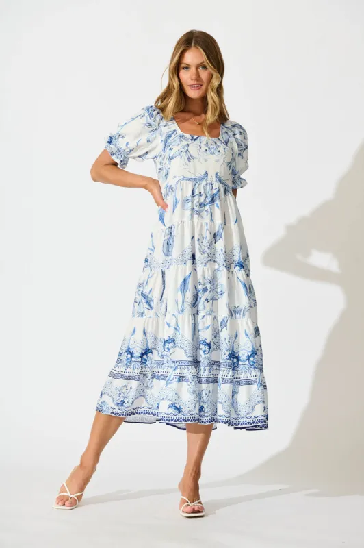 Roseau Midi Dress in White with Blue Floral Border sold by St Frock