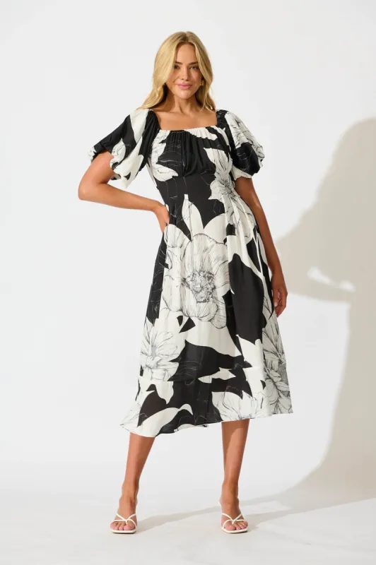 Wintour Midi Dress In Black With White Floral sold by St Frock