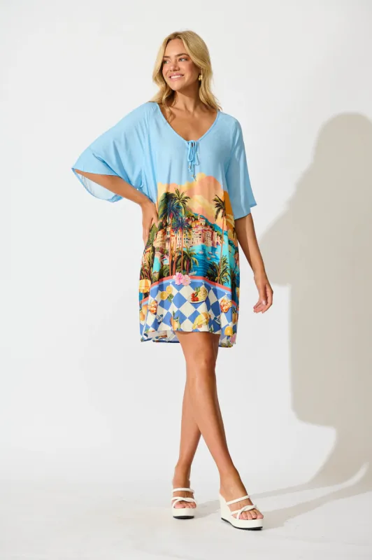 Marla Smock Dress In Light Blue with Multi Tropical Print sold by St Frock