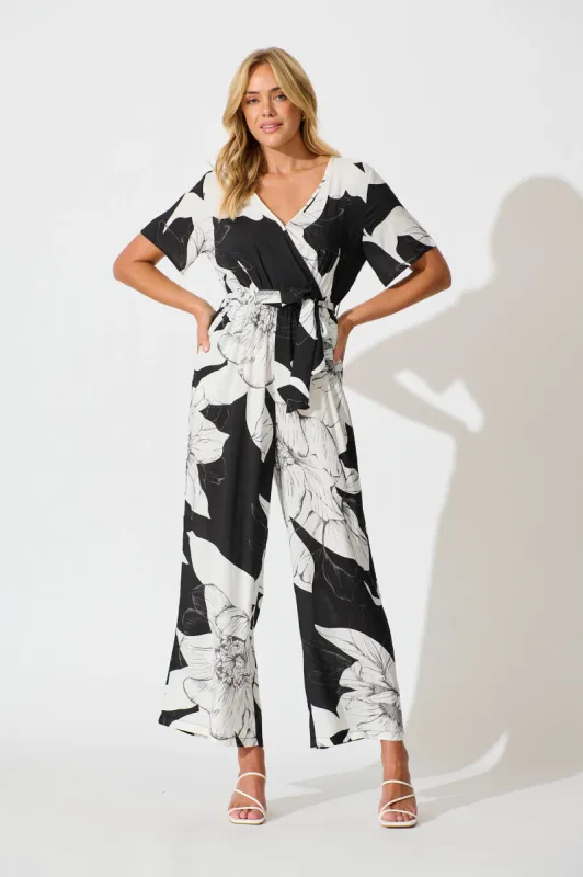 Calliope Jumpsuit In Black With White Floral sold by St Frock