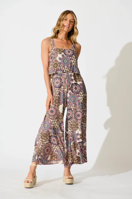 Sandcastle Jumpsuit In Cream With Purple Paisley sold by St Frock