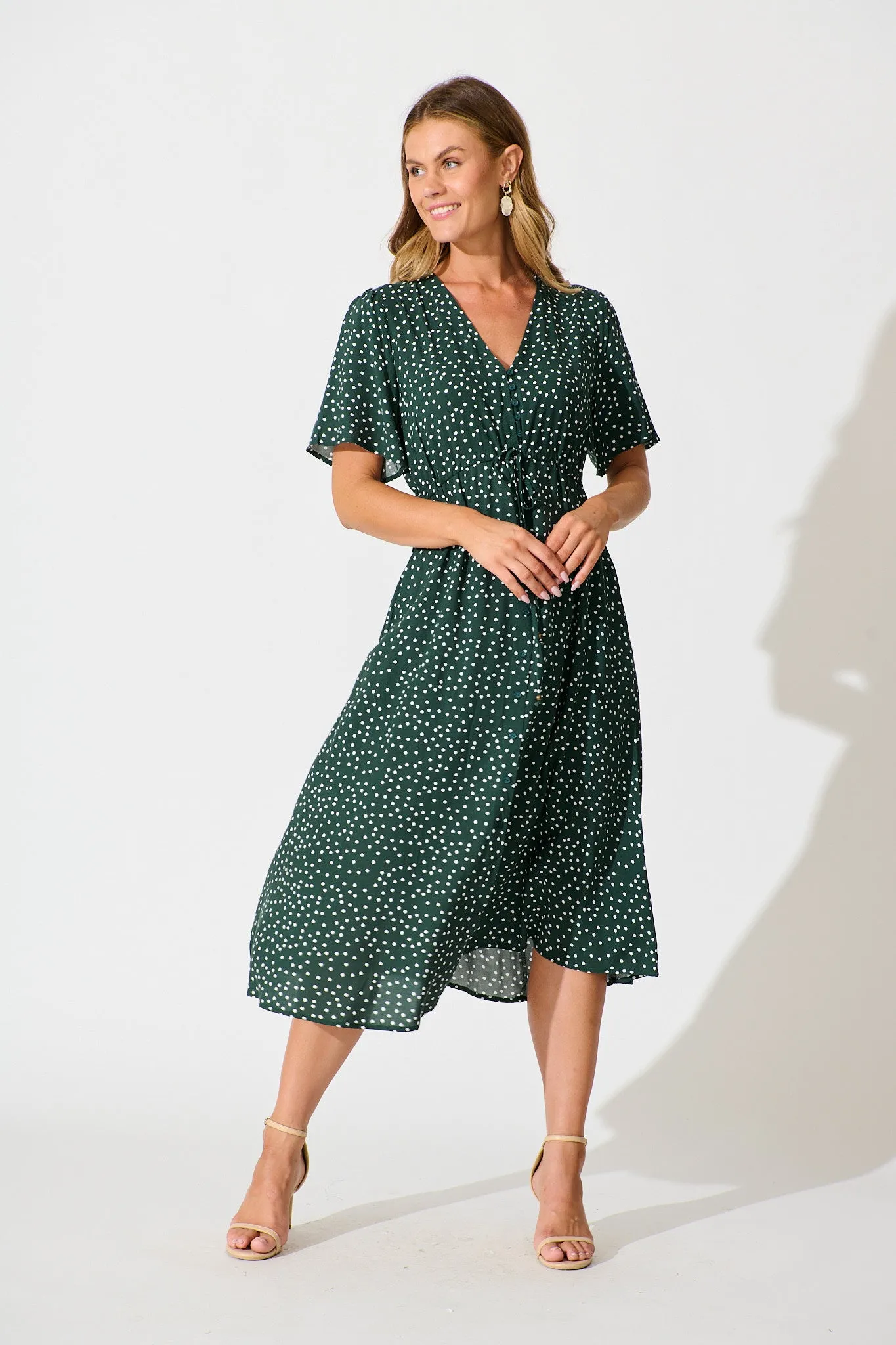 Melody Midi Dress In Emerald With White Spot sold by St Frock