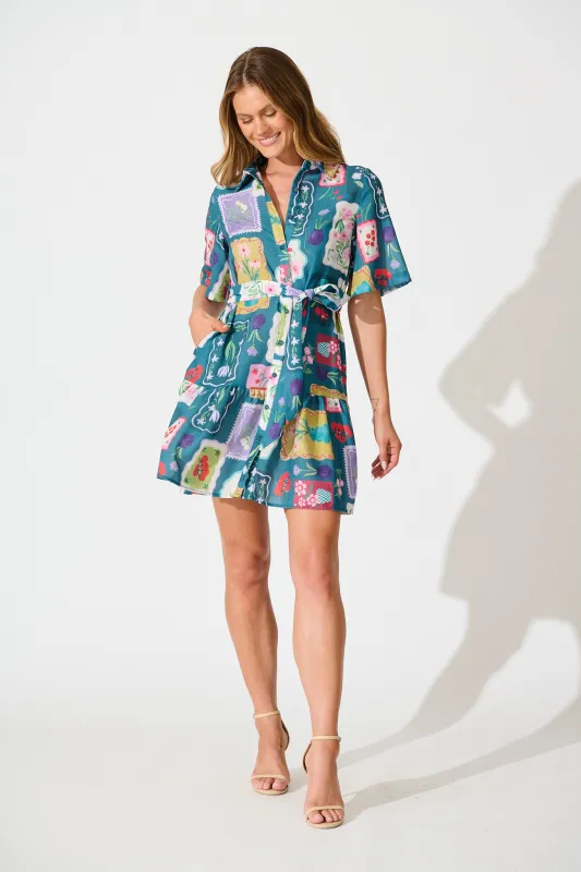 Monte Carlo Shirt Dress in Teal Multi Stamp Print Linen Blend sold by St Frock