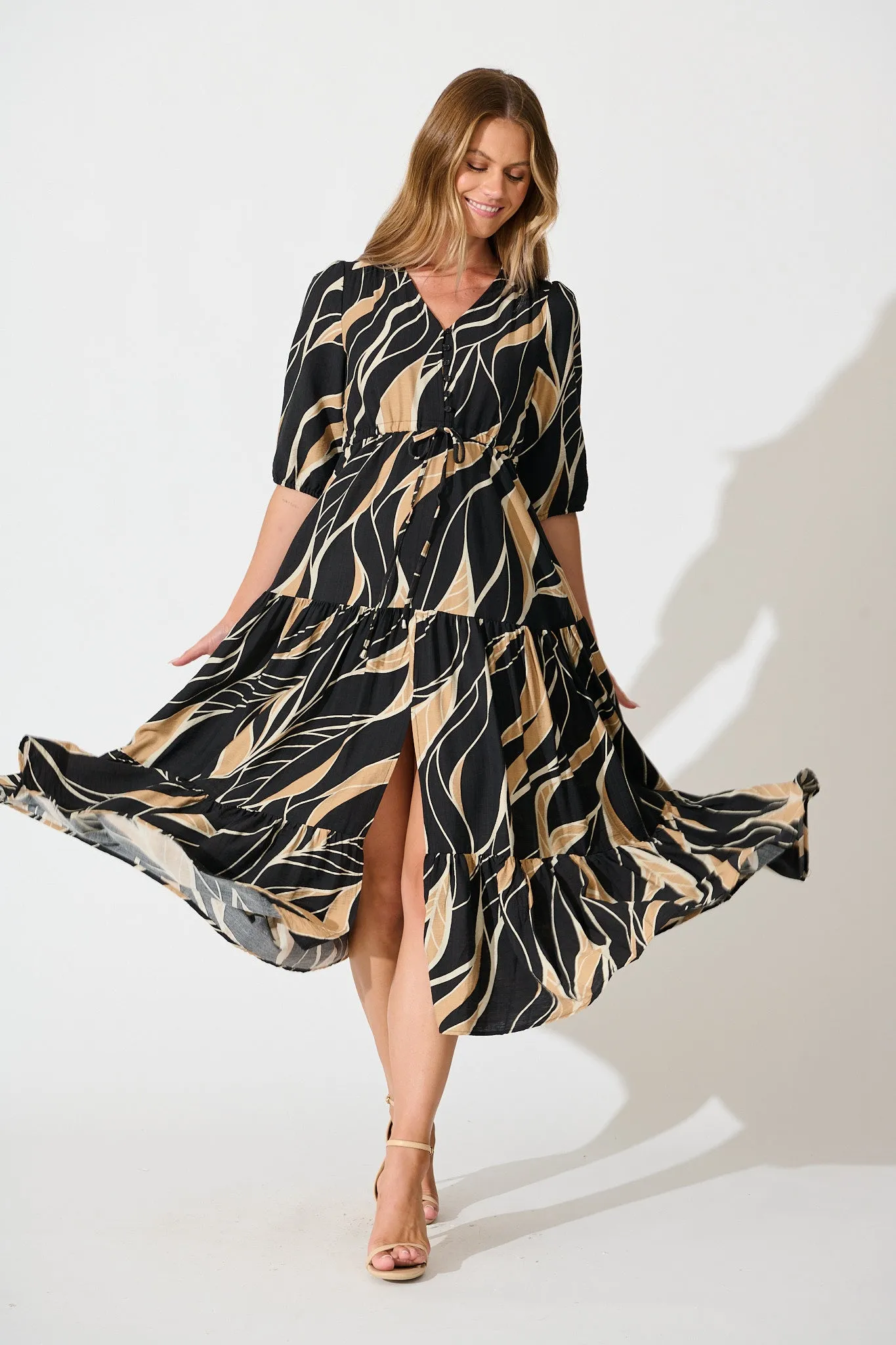 Danielle Midi Dress in Black with Neutral Print sold by St Frock