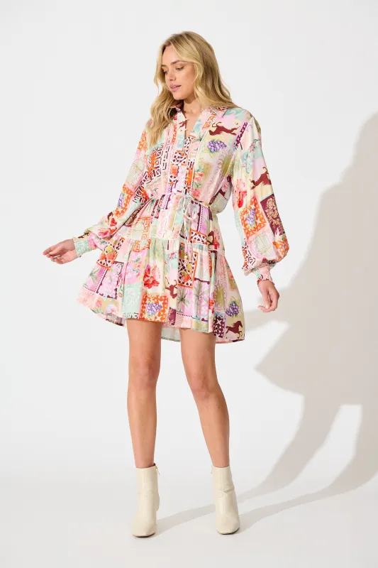 Veronique Dress in Multi Conversational Print sold by St Frock
