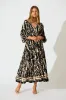 Rosamund Midi Dress in Black with Beige Print sold by St Frock
