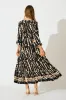 Rosamund Midi Dress in Black with Beige Print sold by St Frock
