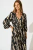 Rosamund Midi Dress in Black with Beige Print sold by St Frock