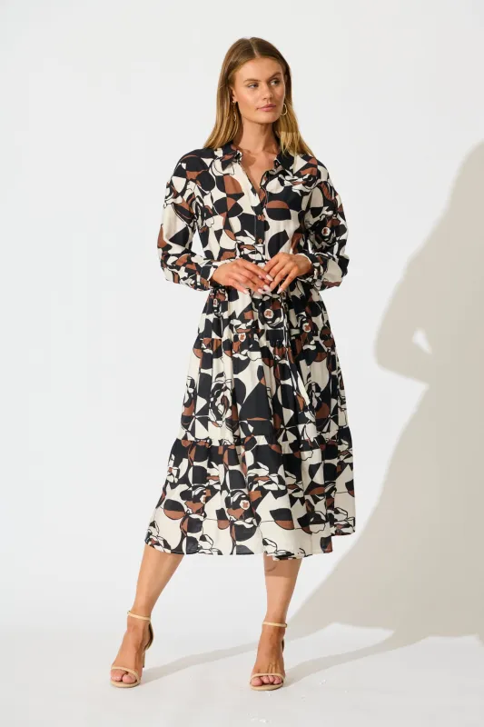 Jada Midi Dress in White with Black and Brown Print sold by St Frock