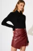 Ascend Leatherette Skirt in Wine sold by St Frock