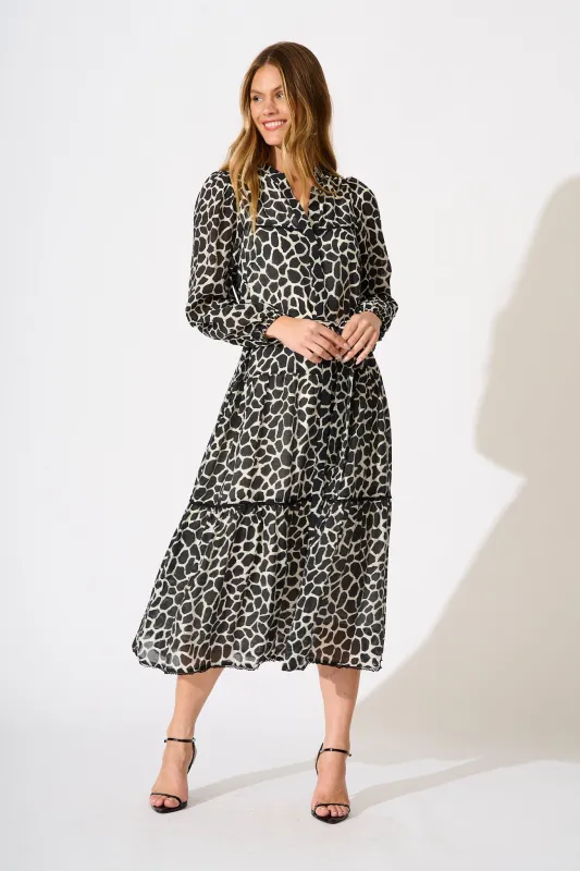 Avery Midi Dress in Black and White Spot sold by St Frock
