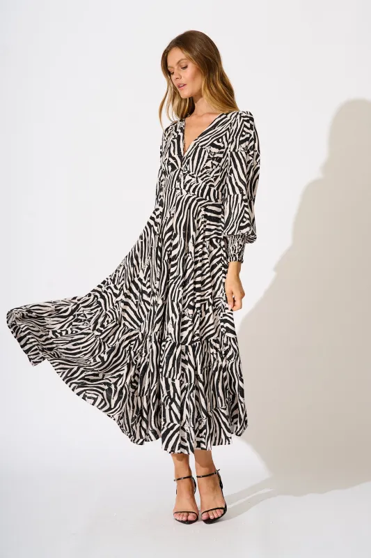 Neveena Maxi Dress In Black with Cream Print sold by St Frock