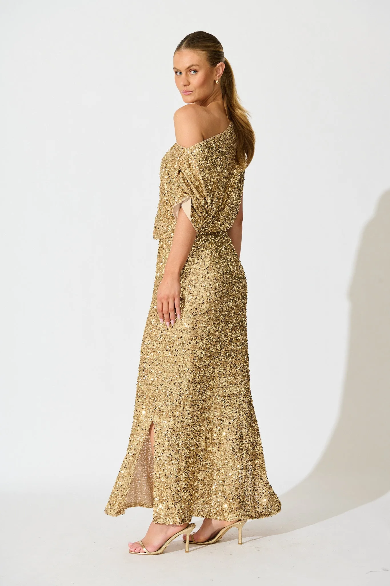 Amiri Off Shoulder Maxi Dress in Gold Sequin sold by St Frock product image thumbnail 3