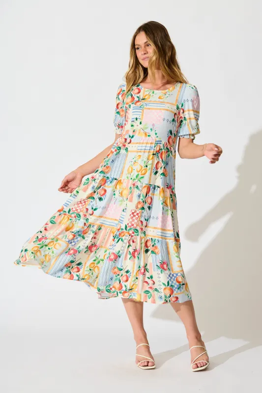 Nevi Tiered Midi Dress In Multi Conversational Print sold by St Frock