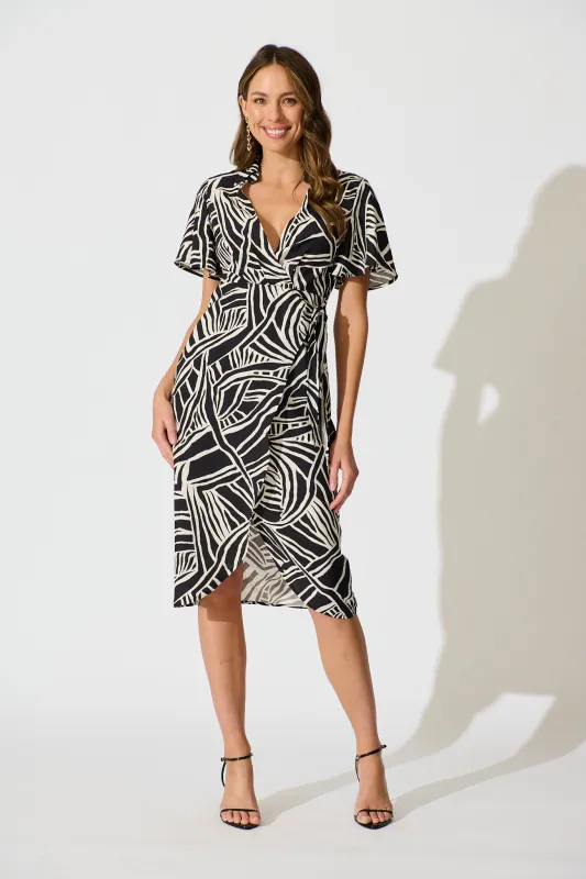 Helenia Midi Wrap Dress in Black and White Cotton Blend sold by St Frock