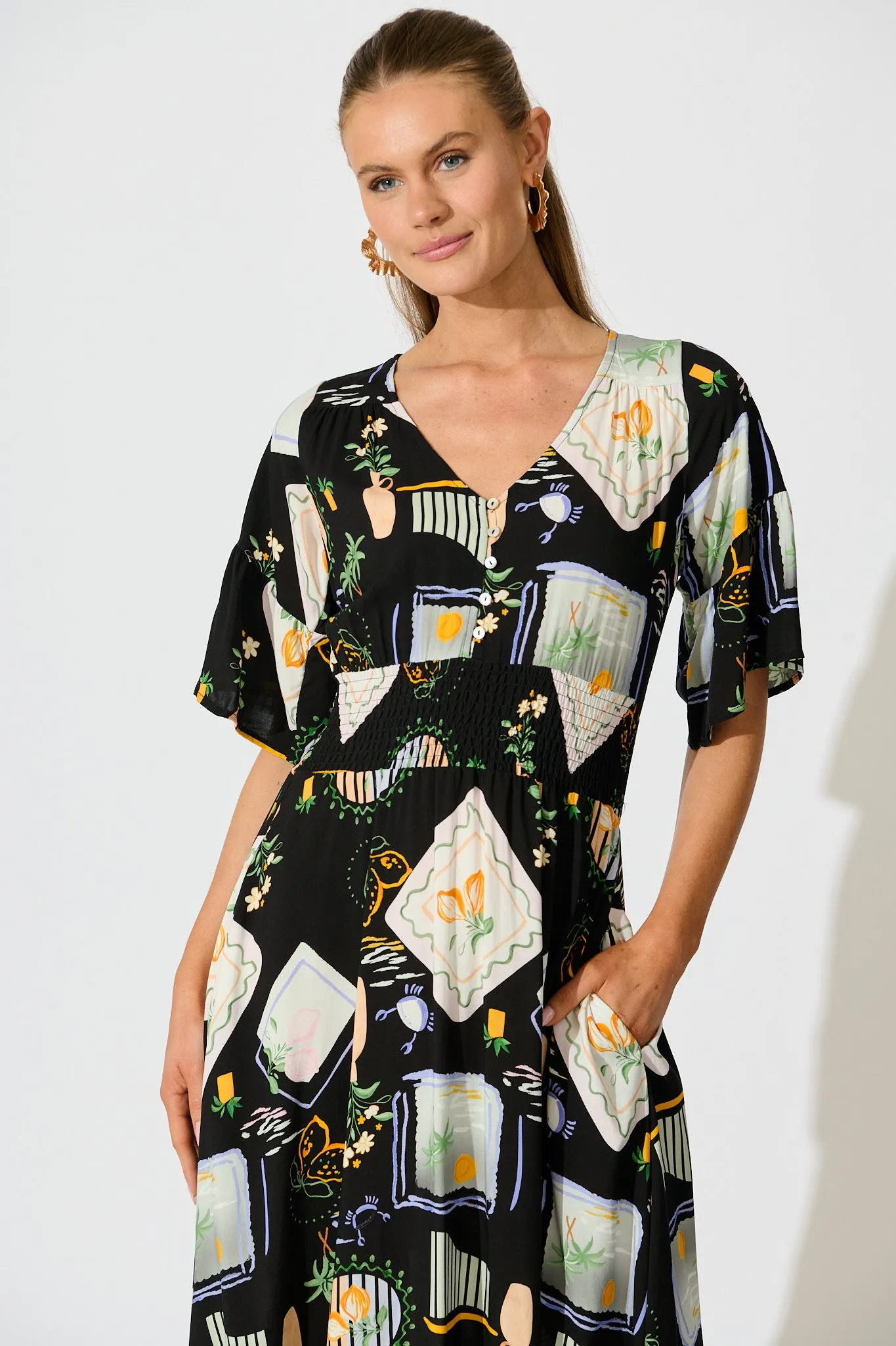 Eloa Midi Dress in Black with Multi Print sold by St Frock product image thumbnail 2