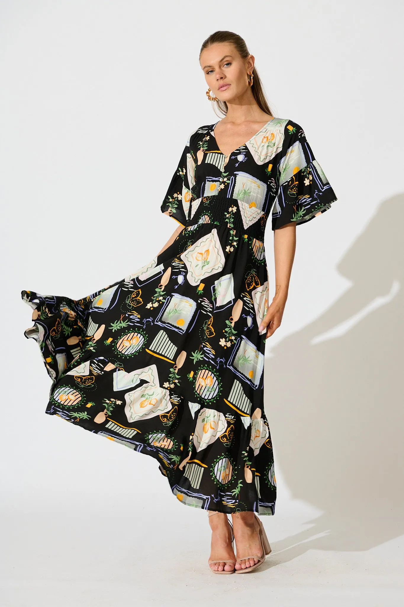 Eloa Midi Dress in Black with Multi Print sold by St Frock