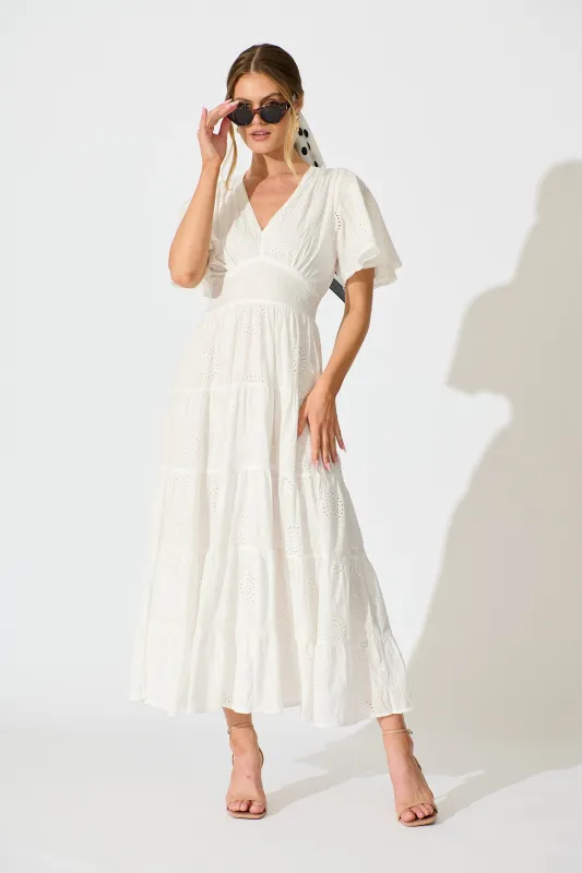 Indra Tierred Maxi Dress In White Embroidered Cotton sold by St Frock