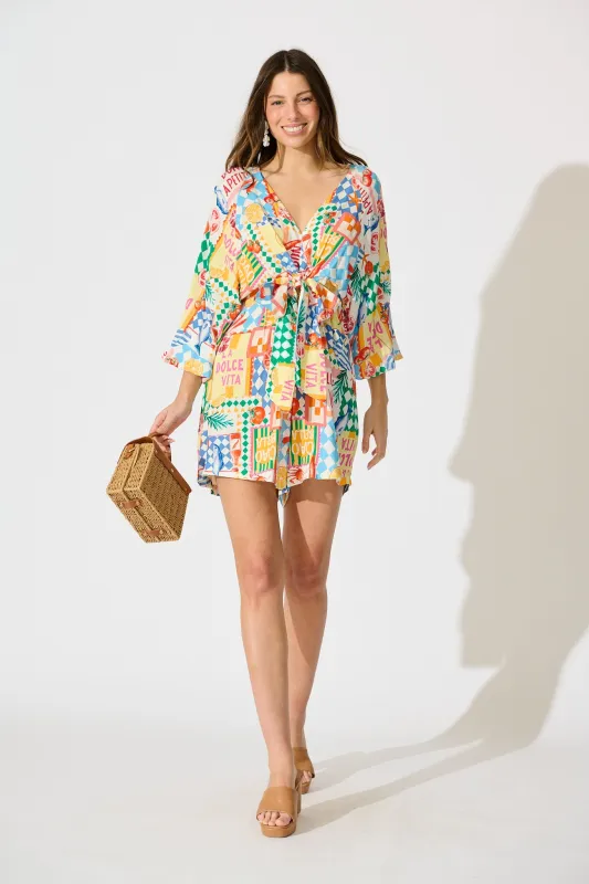 Otillie Playsuit in White Multi Conversational Print sold by St Frock