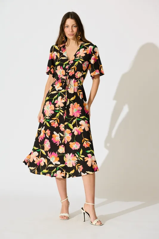 Melody Midi Dress in Black with Tangerine Floral sold by St Frock