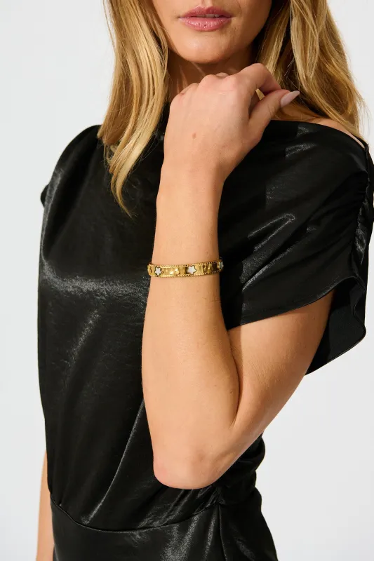 Denzel Bangle in 18K Gold sold by St Frock