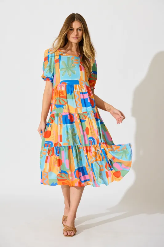 Nevi Tiered Midi Dress in Bright Multi Patchwork Print sold by St Frock