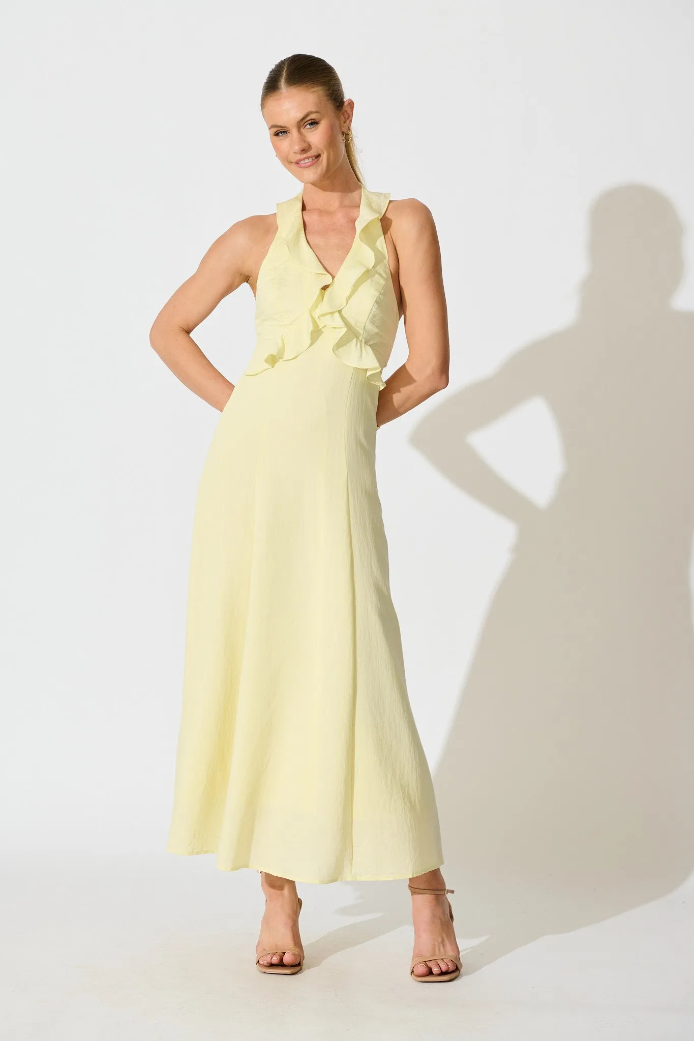 Twila Halter Neck Maxi Dress in Butter Yellow sold by St Frock product image thumbnail 3