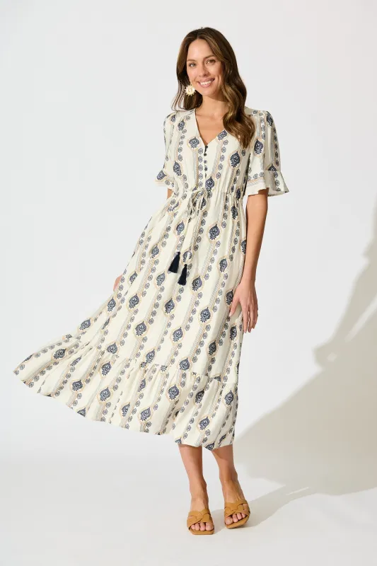 Keri Maxi Dress in Cream and Navy Boho Print sold by St Frock