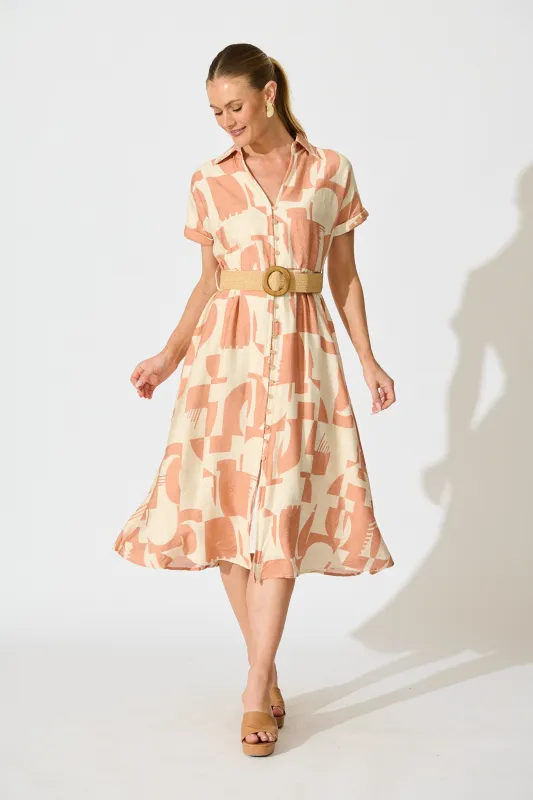 Charli Midi Dress in Rust Geometric Print with Belt sold by St Frock