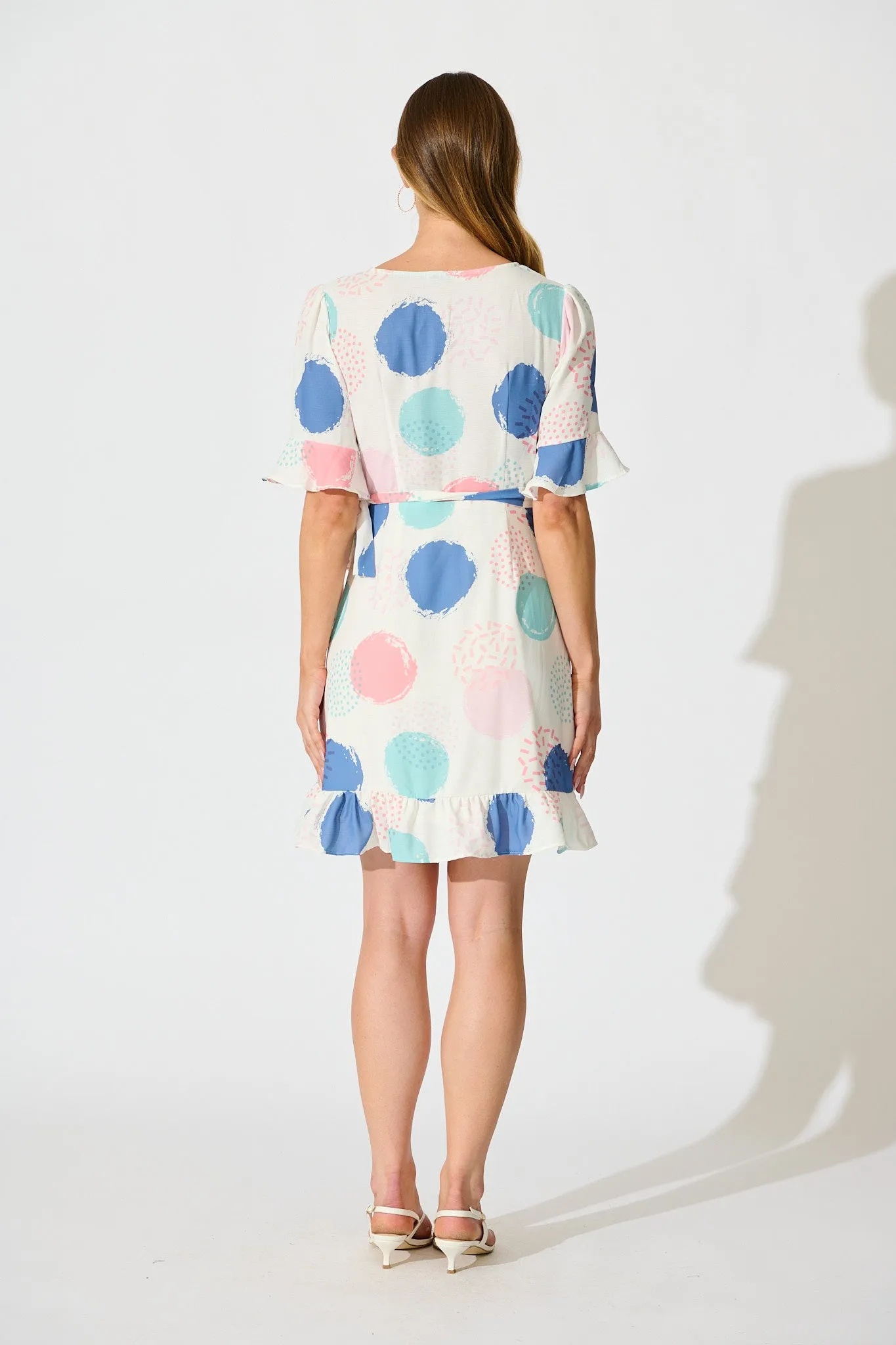 Ariane Wrap Dress In White with Multi Spot Print sold by St Frock product image thumbnail 4