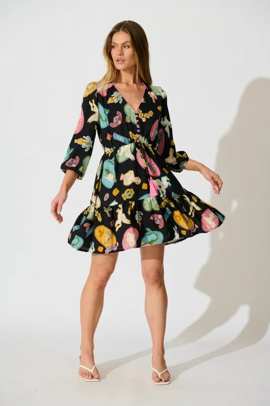 Ailany Dress in Black with Multi Print sold by St Frock