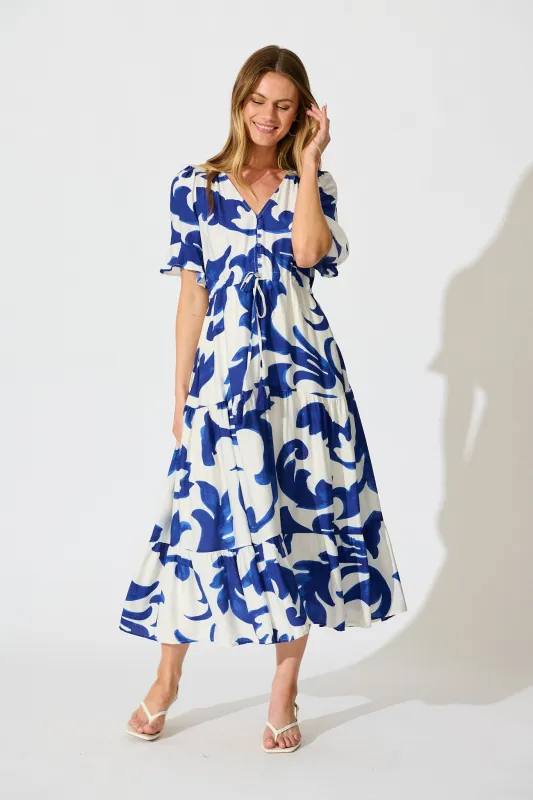 Effia Midi Dress in Blue and White Leaf Print sold by St Frock